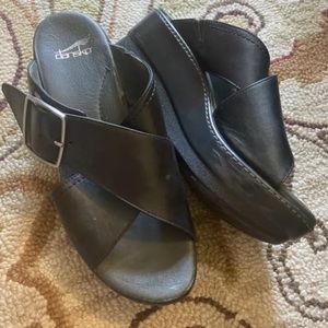 Dansko black leather wedge slip on